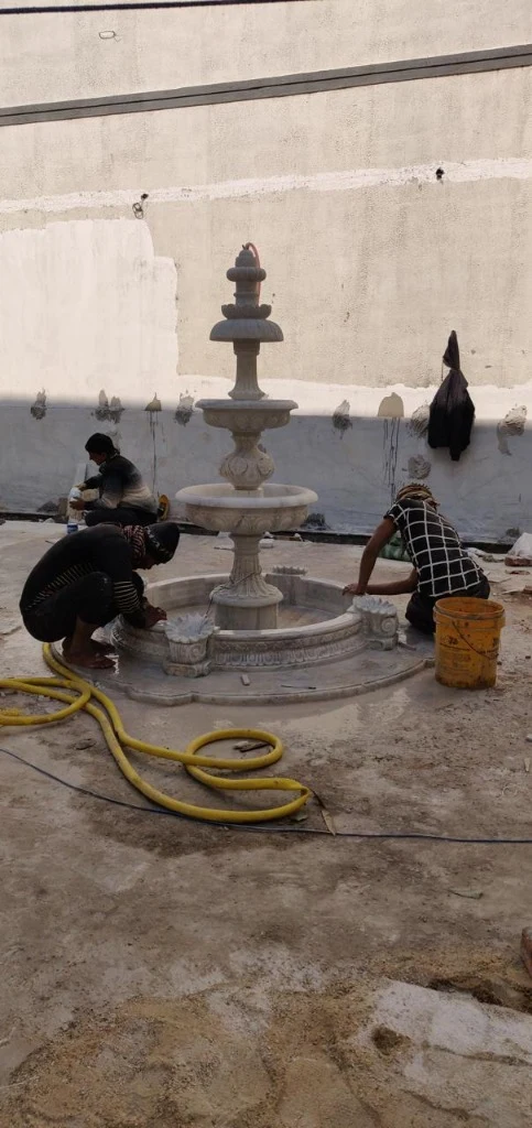 Craftsmen Assembling Grand 3-Tier Marble Courtyard Fountain