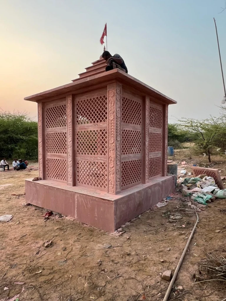 Side View of Carved Red Sandstone Lattice Mandir Pavilion