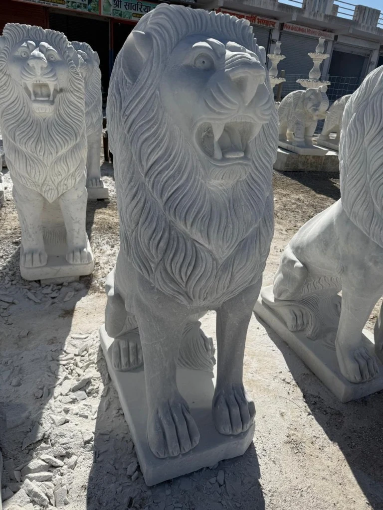 Handcarved White Marble Roaring Lion Statues Pair
